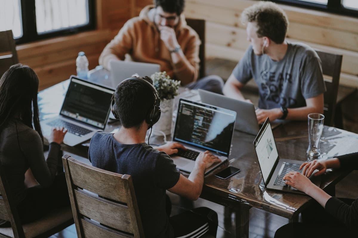 Professional nearshore team collaborating in a modern office